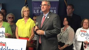 The Indiana GOP’s gubernatorial ticket -- Eric Holcomb and running mate State Auditor Suzanne Crouch at an Indianapolis news conference on Aug. 1, 2016. - Brandon J. Smith / Indiana Public Broadcasting