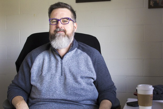 Jim Ansaldo, a research scholar at Indiana University, in his office. Ansaldo also runs an improv summer camp for teens with autism. He says improv-specific programs for children with autism are spreading. (Peter Balonon-Rosen/Indiana Public Broadcasting)
