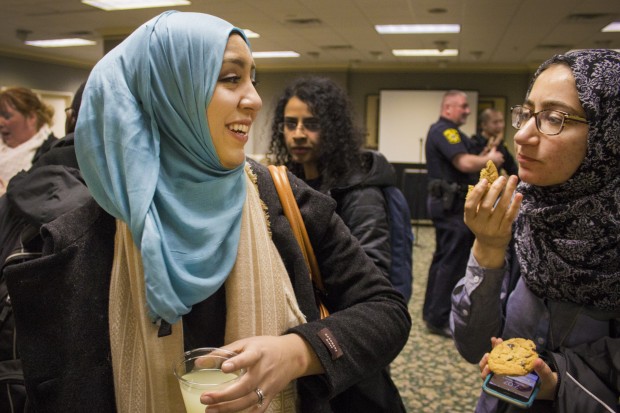 Suzanne Kawamleh speaks with a friend after Indiana University's Feb. 2, 2017 information session about the executive order. (Peter Balonon-Rosen/Indiana Public Broadcasting)