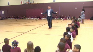 Principal Todd Hawks leads students during the morning meeting, with affirmations and chants. (photo credit: Steve Burns/WTIU)