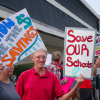 Protestors against the Indianapolis Public Schools administration's proposal to close multiple high schools rally outside the John Morton Finney Center before the final school board vote on Monday, Sept. 18, 2017. (Eric Weddle/WFYI News)